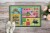 Carolines Treasures 8104-MAT Blue Heron Doormat 18x27 Perspective: back