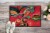 Carolines Treasures  6043MAT Red Flowers and berries Indoor or Outdoor Mat 18x27 Perspective: back