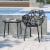 LeisureMod Devon Modern Glass Top Black Aluminum Base Outdoor 23  End Table Perspective: back