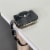 Wrapables Stylish Purse Hook Hanger, Foldable Handbag Table Hanger, Black Baguette Perspective: back