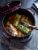 Staub Cast Iron 5.5-qt Round Cocotte - Grenadine Perspective: back
