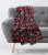 Holiday Home Rolled Christmas Throw Blanket - Poinsettia Blooms Perspective: back