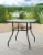 HD Designs Outdoors Square Glass Top Dining Table Perspective: back