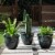 Glitzhome Oversized Faux Ceramic Round Plastic Pot Planter - Black Perspective: back