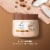 Dove Brown Sugar and Coconut Butter Exfoliating Body Scrub Perspective: bottom