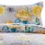 Minsk 20 x 36 King Size Pillow Sham, Yellow Flowers, Gray Cotton Fabric- Saltoro Sherpi Perspective: bottom