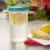 Sterilite 1-Gallon Round Plastic Pitcher and Spout, Clear w/ Color Lid (18 Pack) Perspective: bottom