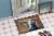 Carolines Treasures MW1165JMAT On the Loose Brown Cow Doormat 24x36 Perspective: bottom