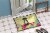 Easter Eggs Greater Swiss Mountain Dog Indoor or Outdoor Mat 18x27 Perspective: bottom
