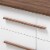 Levan Home Mette Mid-Century 6-Drawer Wood Dresser in White and Walnut Perspective: bottom
