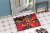 Carolines Treasures  6043MAT Red Flowers and berries Indoor or Outdoor Mat 18x27 Perspective: bottom