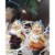 Juvale Happy Mini Gnome Figurines for Fairy Gardens (4 inches, Set of 6) Perspective: bottom
