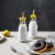 WHOLE HOUSEWARES | 14 Oz Glass Milk Bottle Set of 8+Lids/Straws Perspective: bottom