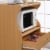 Hodedah Wheeled Microwave Island Cart with Drawer and Cabinet Storage, Beech Perspective: bottom