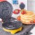 Uncanny Brands Marvel Iron Man Waffle Maker -Shellhead's Helmet on Your Waffles- Waffle Iron Perspective: bottom