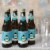 Big Dot of Happiness Holly Jolly Penguin Holiday Christmas 6 Beer Bottle Labels & 1 Carrier Perspective: bottom