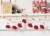 Holiday Home Wooden Garland with Red Boots Perspective: bottom