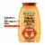 Garnier Whole Blends Honey Treasures Repairing Shampoo for Dry, Damaged Hair Perspective: front