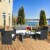 Costway 4PCS Patio Rattan Wicker Furniture Conversation Set Cushioned Sofa Table Perspective: front