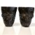 4 Halloween Black Shot Glasses with Spooky 3D Skull Shape Perspective: front
