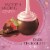 Lindt LINDOR Valentine's Day Strawberry Dark Chocolate Candy Truffles Bag Perspective: left