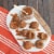 Nordic Ware Apple Slice Cakelet Pan - Bronze Perspective: left