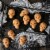 Nordic Ware Skull Bites Cakelet Pan - Brown Perspective: left