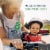 Gerber® Wonderfoods™ 2nd Foods® Organic Apple Zucchini Spinach & Strawberry Baby Food Pouch Perspective: left