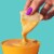 Taco Bell Mild Salsa Con Queso Cheese Dip Perspective: left