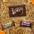 Snickers & M&M'S Milk Chocolate & Milky Way Chocolate Bars Halloween Candy Assortment Perspective: left