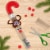 Snickers Christmas Minis Size Chocolate Candy Cane Tube Perspective: left