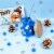M&M’S White Chocolate Pretzel Snowballs Holiday Candy Perspective: left