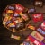 M&M'S Milk Chocolate Skittles Snickers Starburst & Twix Halloween Candy Assortment Perspective: left