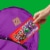 M&M'S Limited Edition Peanut Butter Milk Chocolate Candy featuring Purple Candy Bag Perspective: left