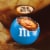 M&M'S Caramel Cold Brew Milk Chocolate Candy Sharing Size Bag Perspective: left