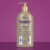 Gold Bond Cocoa Butter Glow Daily Hydrating Lotion with Shea Butter Cocoa Butter & Coconut Oil Perspective: left