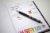 G-350 Retractable Gel Pen in Black Rapid Dry Ink, with 2 Bonus Refills, Blue and Red, 0.7 mm, 2-Pack Perspective: left