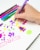 Zebra Doodlerz Gel Stick Pen, Bold Point, 1.0mm, Assorted Neon Colors, 10 Pack Perspective: left