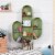 Babyletto Cactus Bookcase in Sage Green Perspective: left
