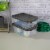 Sterilite 16 Quart Clear Plastic Stacking Storage Container Box with Gray Lid Perspective: left