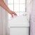 Sterilite 13 Gal Swing Top Lidded Wastebasket Kitchen Trash Can, White (8 Pack) Perspective: left