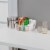 Sterilite 9.5 x 6.5 x 4 Inch Clear Open Storage Bin with Carry Handles (64 Pack) Perspective: left