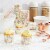 50-Pack Muffin Liners - Vintage Floral Cupcake Wrappers Paper Baking Cups Perspective: left