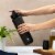 Manna™ Push Bottle Plastic- Black Perspective: left