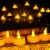24pcs LED Tea Lights Timer Flameless Flickering Candles Amber Yellow Décor Perspective: left
