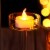 AGPtEK 100pcs LED Tealight Candles Battery Operated Flameless Steady Amber Yellow Perspective: left