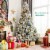 Costway 8ft Snow Flocked Christmas Tree Glitter Tips w/ Pine Cone & Red Berries Perspective: left