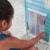 KidKraft Zoey Magic Lights & Sounds Dollhouse with EZ Kraft Assembly™ Perspective: left
