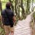 Wild Wolf Outfitters 40oz Bottle Holder Black - Military Grade w/ 2 Pockets & Shoulder Strap Perspective: left