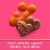 Ghirardelli® Milk Chocolate Caramel Duet Hearts Valentine Candy Perspective: left